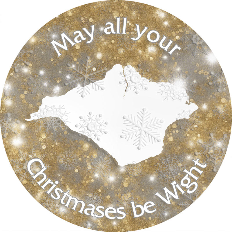 The "May all your Christmases be Wight" bauble by Available Light Photography features a gold circular design adorned with snowflakes and a map cutout, accompanied by the festive message.